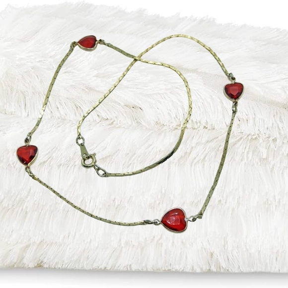 Jewelry - 🔴15/$25. Ruby Colored CZ Hearts (4) Gold Tone Necklace